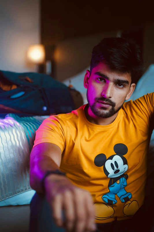 man in yellow crew neck t-shirt